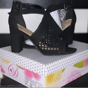 Super cute black heels. Never worn